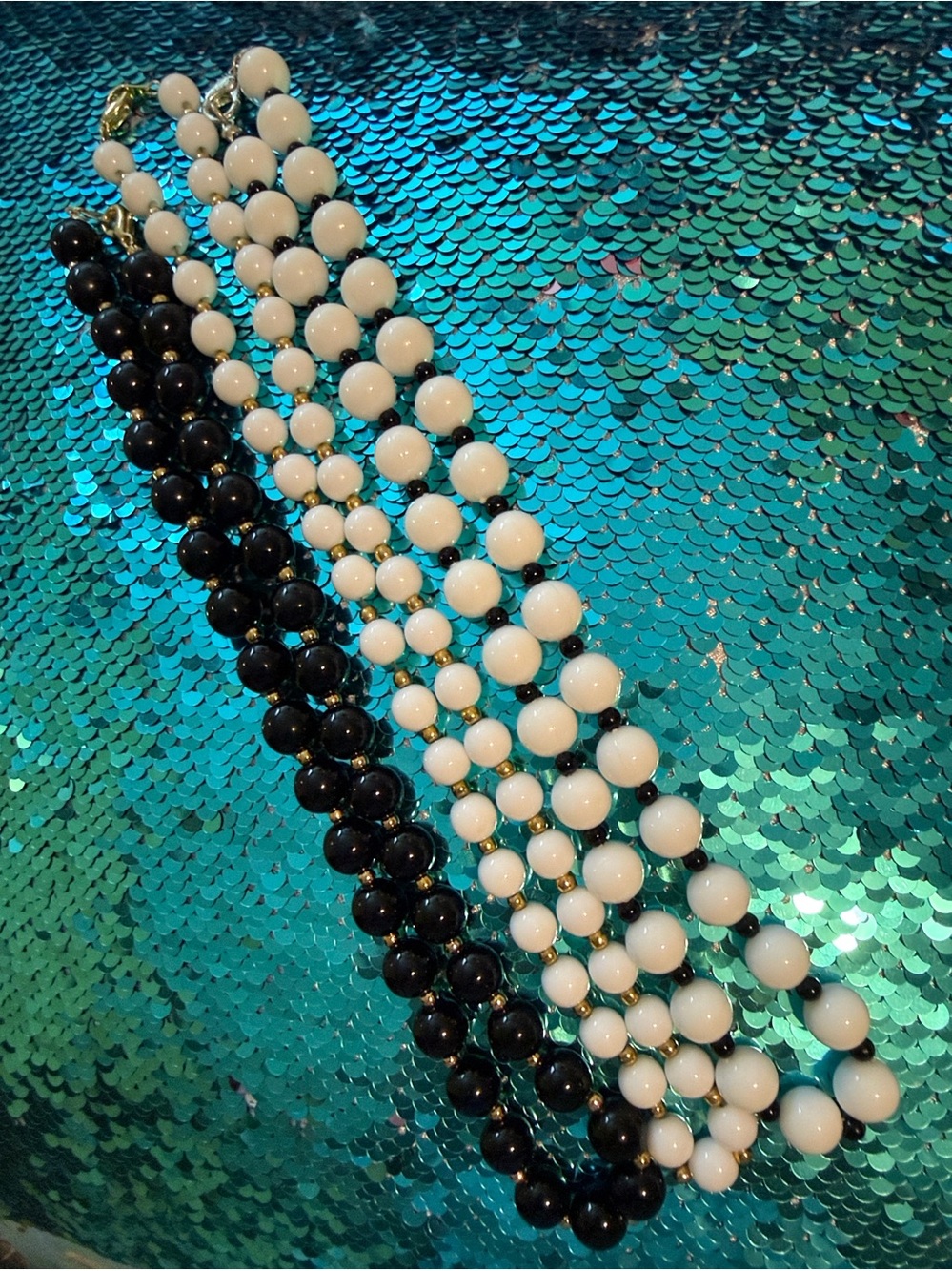 Collection of 3 vintage black, white and gold 18-19” beaded necklaces, EUC